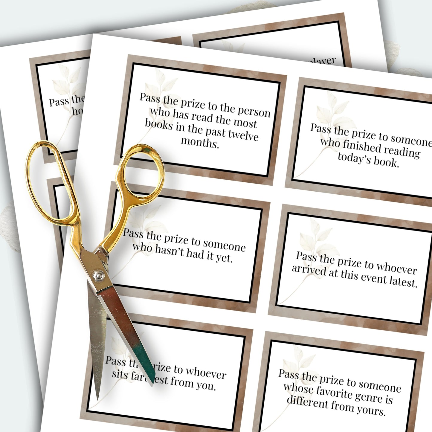 Set of cards with text instructions and a pair of scissors on a white background